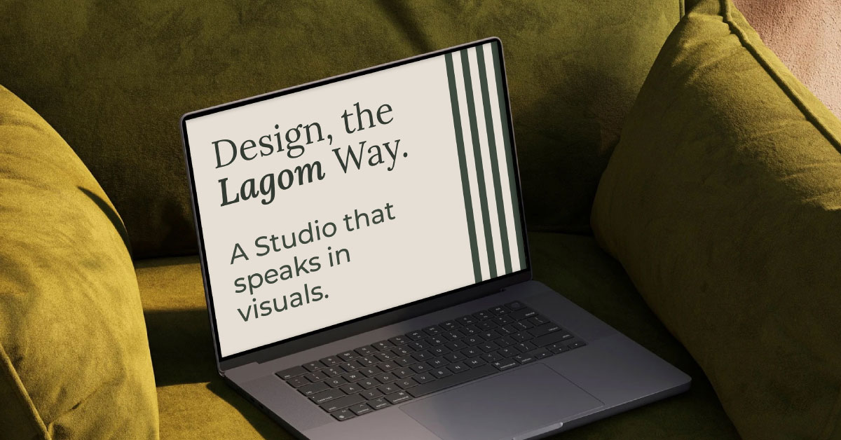 A laptop on a green velvet sofa displaying Lagom Design — Design, the Lagom Way. A studio that speaks in visuals.